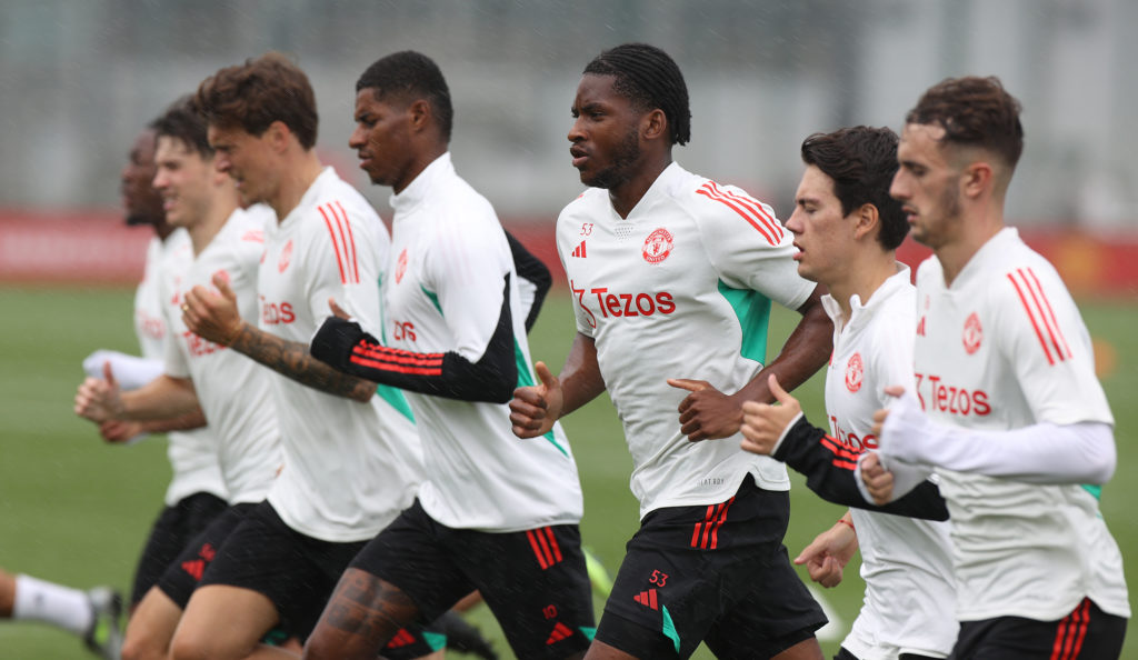 Willy Kambwala pictured taking on first team stars as he is called up to Manchester United training