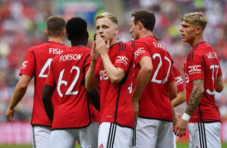 Donny van de Beek of Manchester United celebrates scoring with his team mates during the pre-season friendly match between Manchester United and Ol...