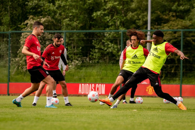 (EXCLUSIVE COVERAGE)  Diogo Dalot, Bruno Fernandes, Hannibal Mejbri, Teden Mengi of Manchester United in action during a first team training sessio...