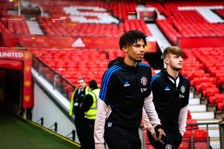 Ethan Williams of Manchester United inspects the pitch prior to the Premier League 2 match between Manchester United and Arsenal U21's at Old Traff...