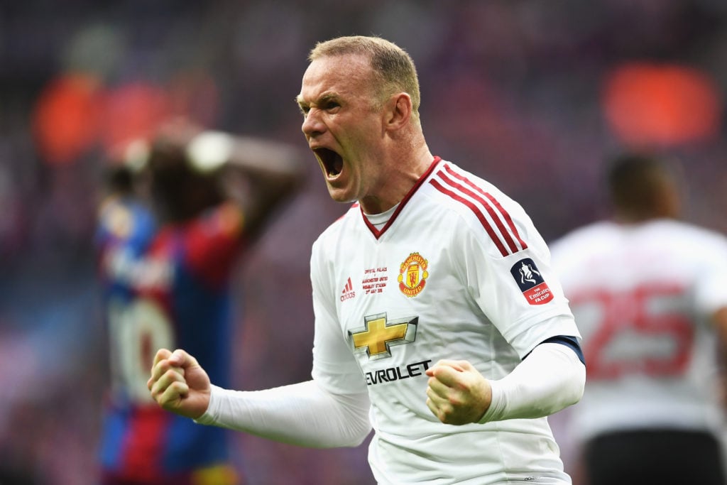 Manchester United's Wayne Rooney celebrates his side's first goal by Juan Mata (not pictured) during the Emirates FA Cup Final match between Manch...