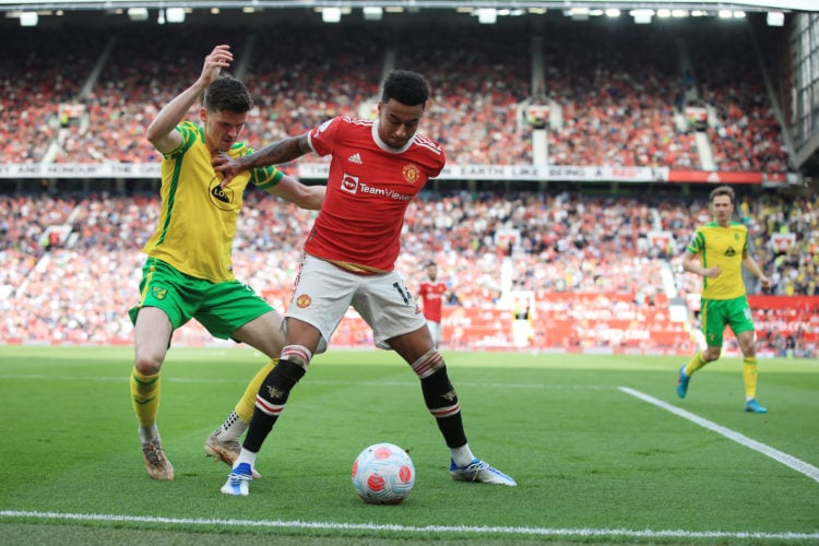 Jesse Lingard of Manchester United battles with Sam Byram of Norwich City during the Premier League match between Manchester United and Norwich Cit...