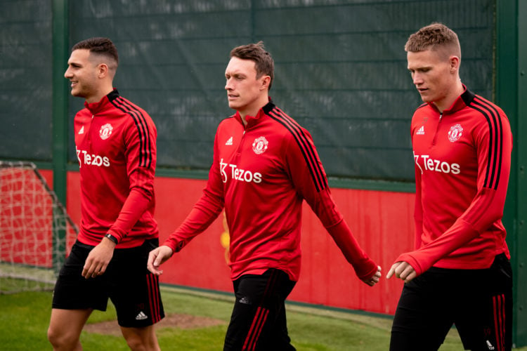 (EXCLUSIVE COVERAGE)  Diogo Dalot, Phil Jones, Scott McTominay of Manchester United in action during a first team training session at Carrington Tr...