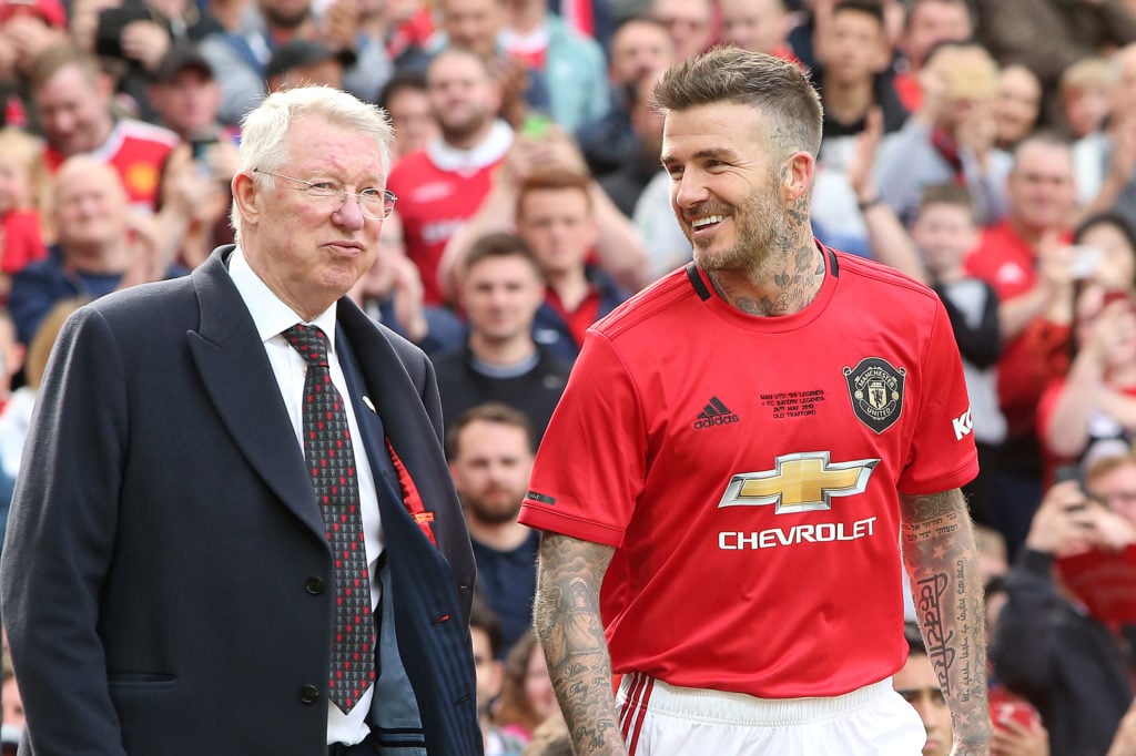 David Beckham of Manchester United '99 Legends walks out with Manchester United '99 Legends Manager Sir Alex Ferguson prior to the 20 Years Treble ...