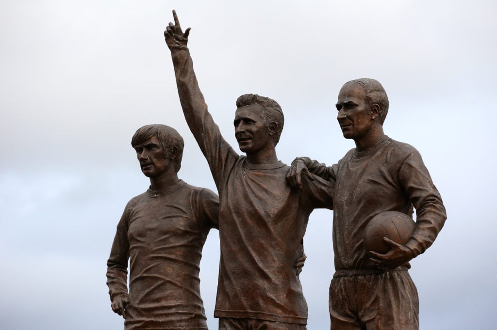 A statue of United Trinity, the trio of George Best, Denis Law and Sir Bobby Charlton is seen prior to the Premier League match between Manchester ...