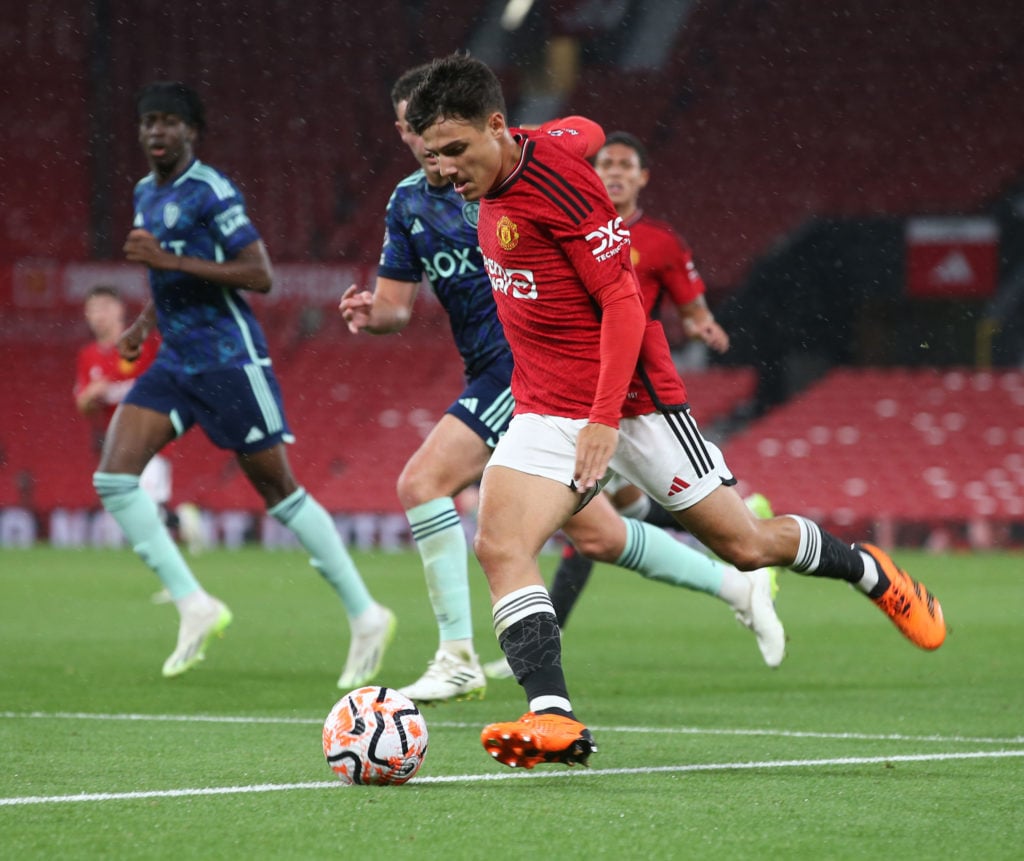 Marc Jurado dribbling the ball for Manchester United