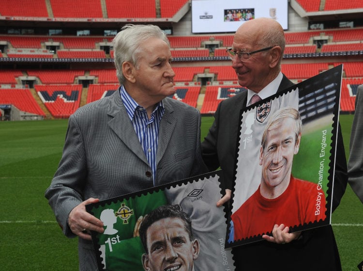 Sir Bobby Charlton and Dave Mackay chat as they pose for pictures with their stamps during the Royal Mail Stamp Launch at Wembley Stadium on May 8,...