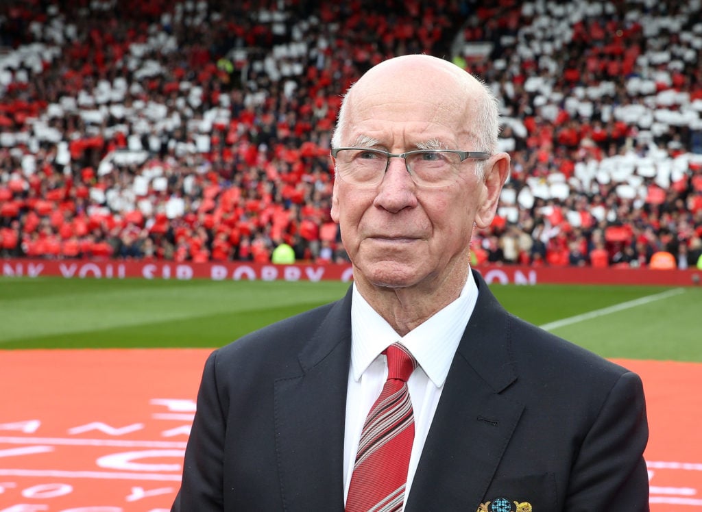 Sir Bobby Charlton of Manchester United attends the unveiling of a stand renamed in his honour ahead of the Barclays Premier League match between M...