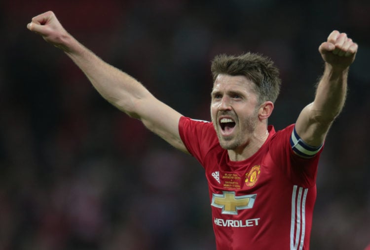 Manchester United's Michael Carrick celebrates they win during the EFL Cup Final Match between Manchester United and Southampton on February 26 at ...