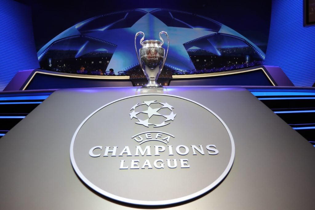 TOPSHOT - The Champions League Trophy stands on display during the UEFA Champions League football group stage draw ceremony in Monaco on August 24,...