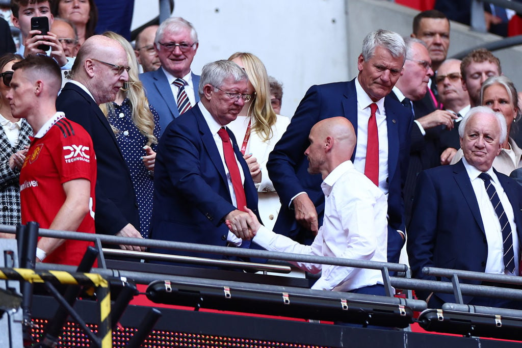 Manchester United manager Erik Ten Hag shakes hands with Sir Alex Ferguson after the Emirates FA Cup final between Manchester City and Manchester...