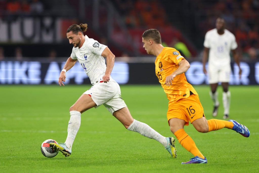 Adrien Rabiot of France battles for possession with Joey Veerman of Netherlands during the UEFA EURO 2024 European qualifier match between Netherla...