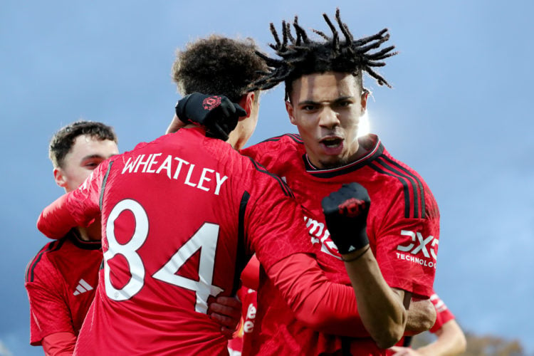 Ethan Wheatley of Manchester United celebrates with team mate Ethan Williams after scoring their sides second goal during the UEFA Youth League 202...