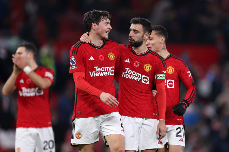 Victor Lindeloef and Bruno Fernandes of Manchester United celebrate after the team's victory in the Premier League match between Manchester United ...