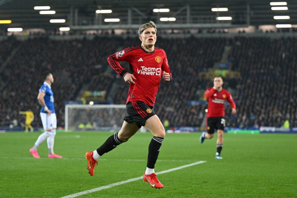 Alejandro Garnacho of Manchester United celebrates after scoring the team's first goal during the Premier League match between Everton FC and Manch...