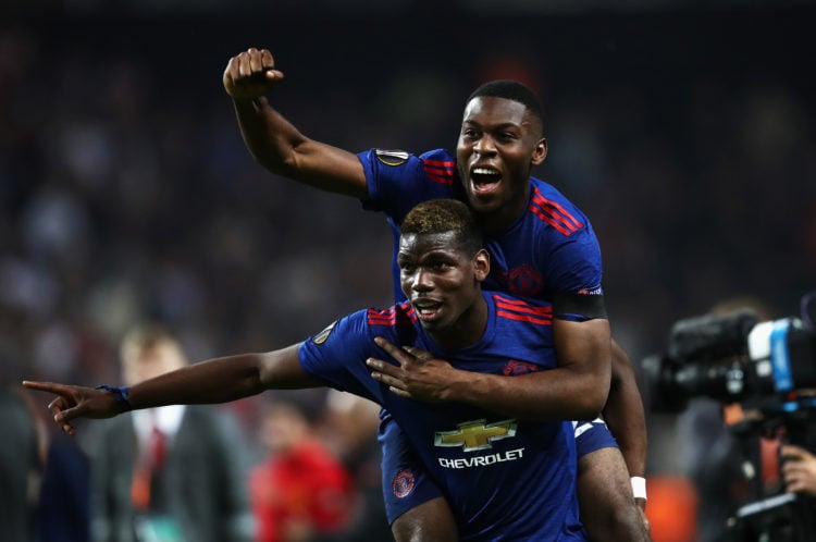 Paul Pogba of Manchester United celerbates with Timothy Fosu-Mensah of Manchester United after the UEFA Europa League Final between Ajax and Manche...