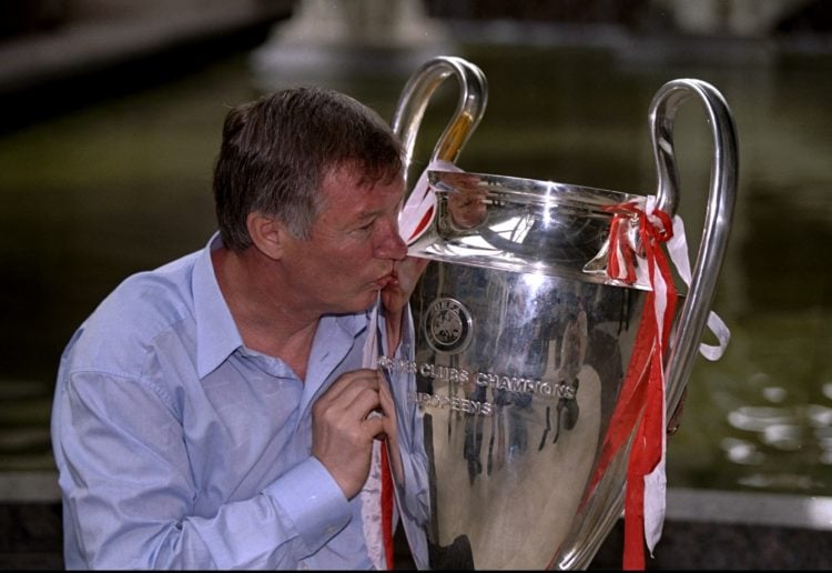 Manchester United manager Alex Ferguson kisses the European Cup on his return to Manchester after victory in the UEFA Champions League final over B...