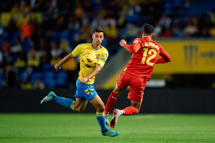 Enzo Loiodice of UD Las Palmas and Mason Greenwood  of Getafe CF in action during the LaLiga EA Sports match between UD Las Palmas and Getafe CF at...