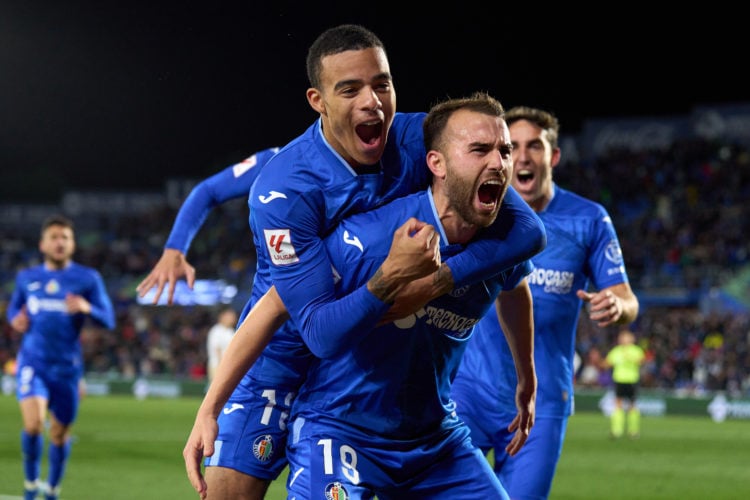 Borja Mayoral of Getafe CF celebrates with Mason Greenwood after scoring the team's first goal during the LaLiga EA Sports match between Getafe CF ...