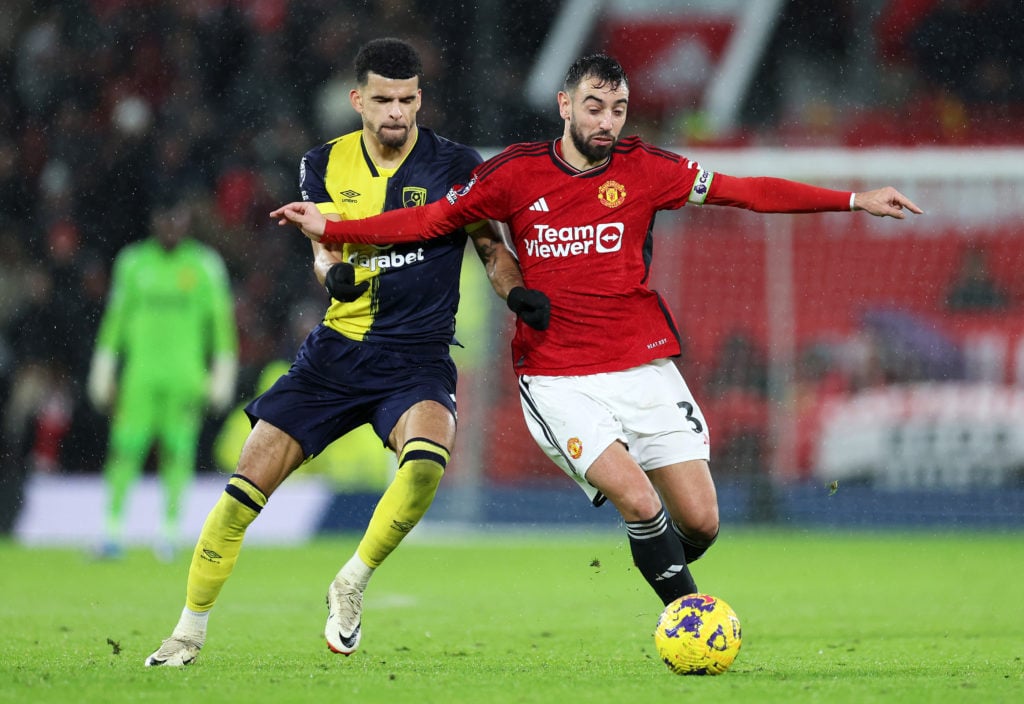 Bruno Fernandes of Manchester United is challenged by Dominic Solanke of AFC Bournemouth during the Premier League match between Manchester United ...