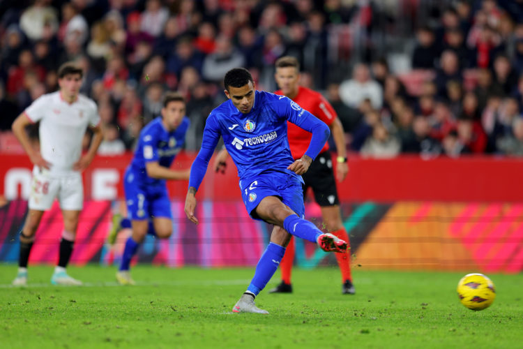 Mason Greenwood of Getafe CF scores their team's third goal from the penalty spot during the LaLiga EA Sports match between Sevilla FC and Getafe C...