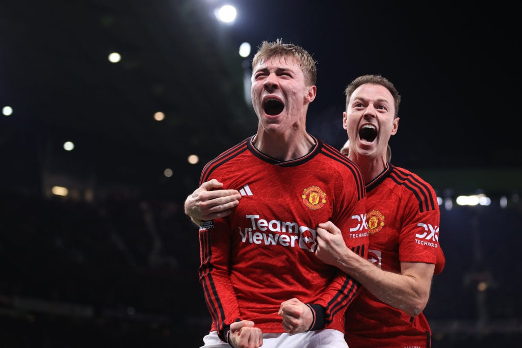 Rasmus Hojlund of Manchester United celebrates with Jonny Evans of Manchester United after scoring their 3rd goal during the Premier League match b...