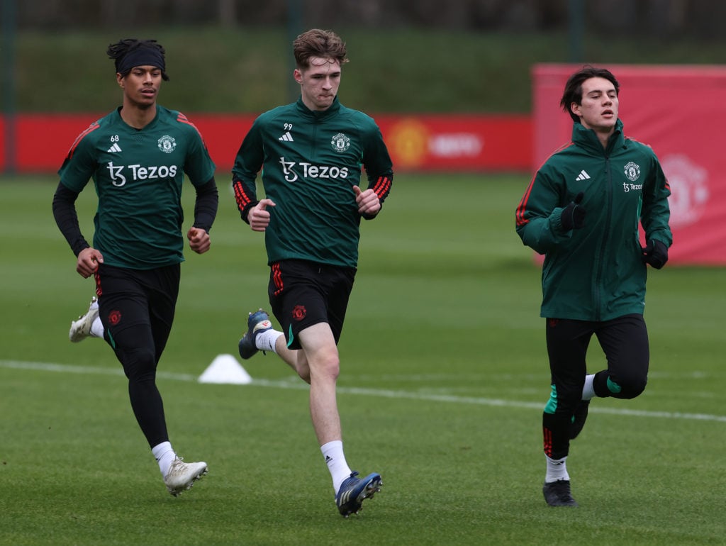 (EXCLUSIVE COVERAGE) Maxi Oyedele, Jack Fletcher, Facundo Pellistri of Manchester United in action during a first team training session at Carringt...