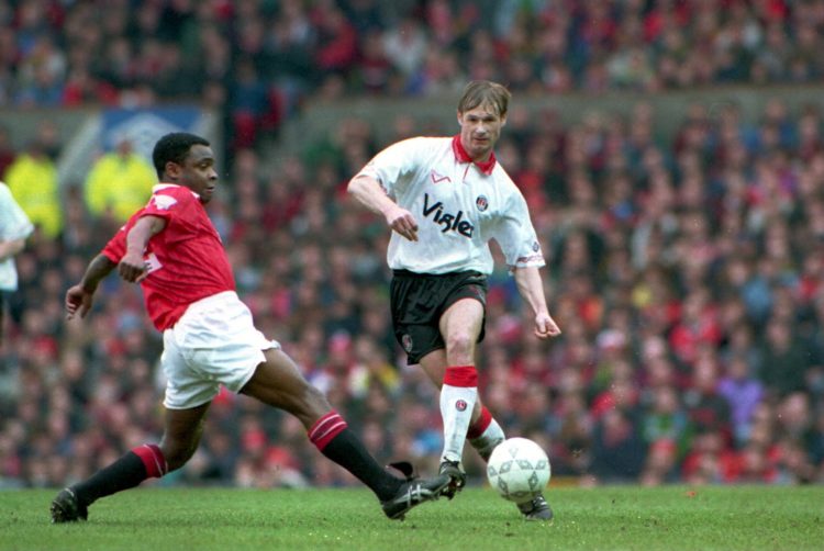 12 MAR 1994:  GARRY NELSON OF CHARLTON SOCCER TEAM IS TACKLED BY PAUL PARKER OF MANCHESTER UNITED DURING THEIR FA CUP SIXTH ROUND MATCH IN MANCHEST...