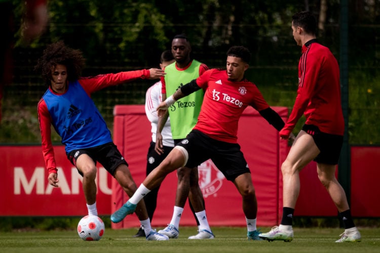 (EXCLUSIVE COVERAGE) Hannibal Mejbri and Jadon Sancho of Manchester United in action during a first team training session at Carrington Training Gr...