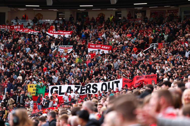 Fans of Manchester United protest agains the clubs ownership, The Glazer Family during the Premier League match between Manchester United and Brigh...