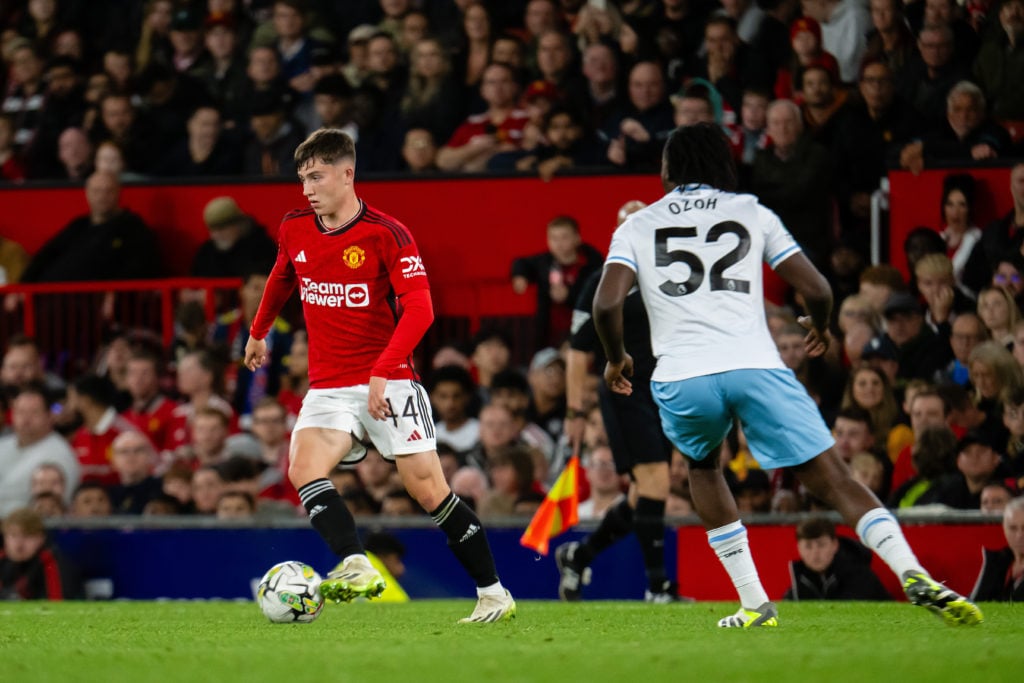 Dan Gore of Manchester United in action with David Ozoh of Crystal Palace during the Carabao Cup Third Round match between Manchester United and Cr...