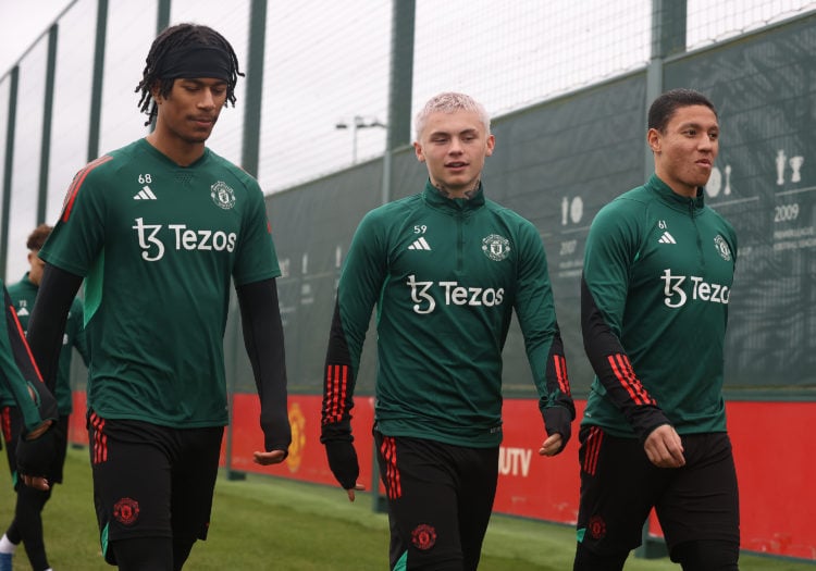 (EXCLUSIVE COVERAGE) Maxi Oyedele, Isak Hansen-Aaroen, Mateo Mejia of Manchester United in action during a first team training session at Carringto...