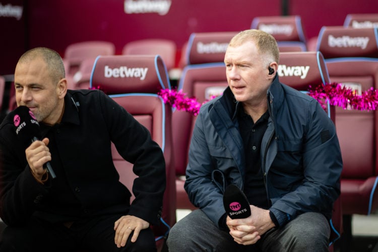 Joe Cole & Paul Scholes look on prior to the Premier League match between West Ham United and Manchester United at London Stadium on December 2...