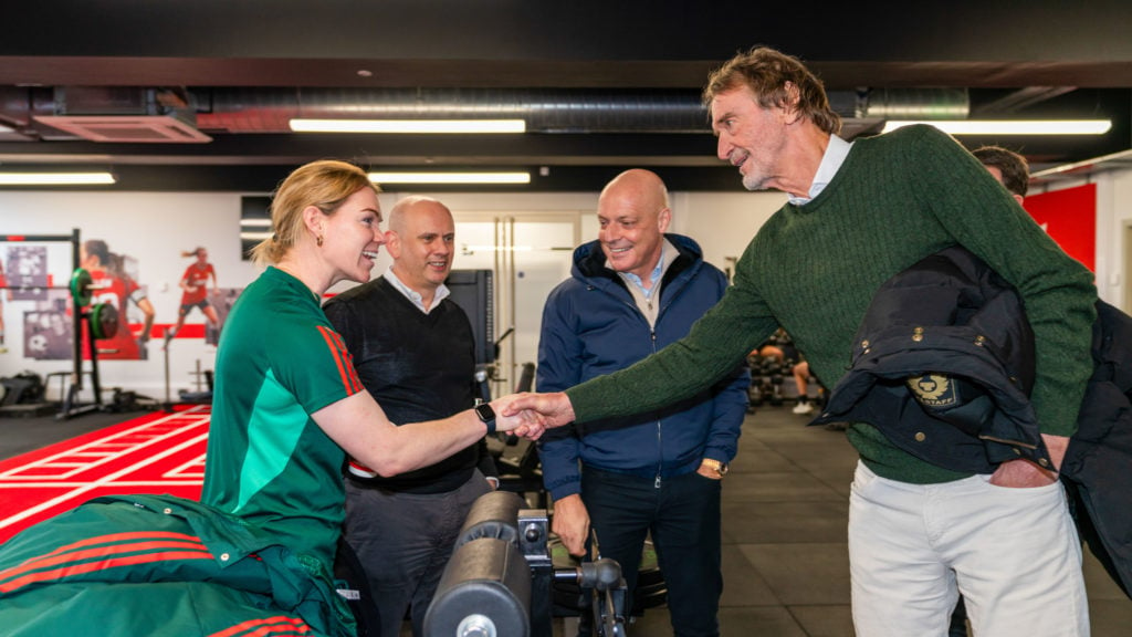 Sir Jim Ratcliffe and Sir Dave Brailsford of INEOS meet Aoife Mannion before meeting the rest of the Manchester United Women's team at Carrington T...