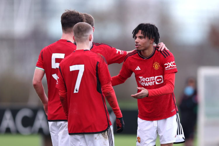 Ethan Williams of Manchester United U18 celebrates scoring his team's first goal with teammates during the U18 Premier League match between Newcast...