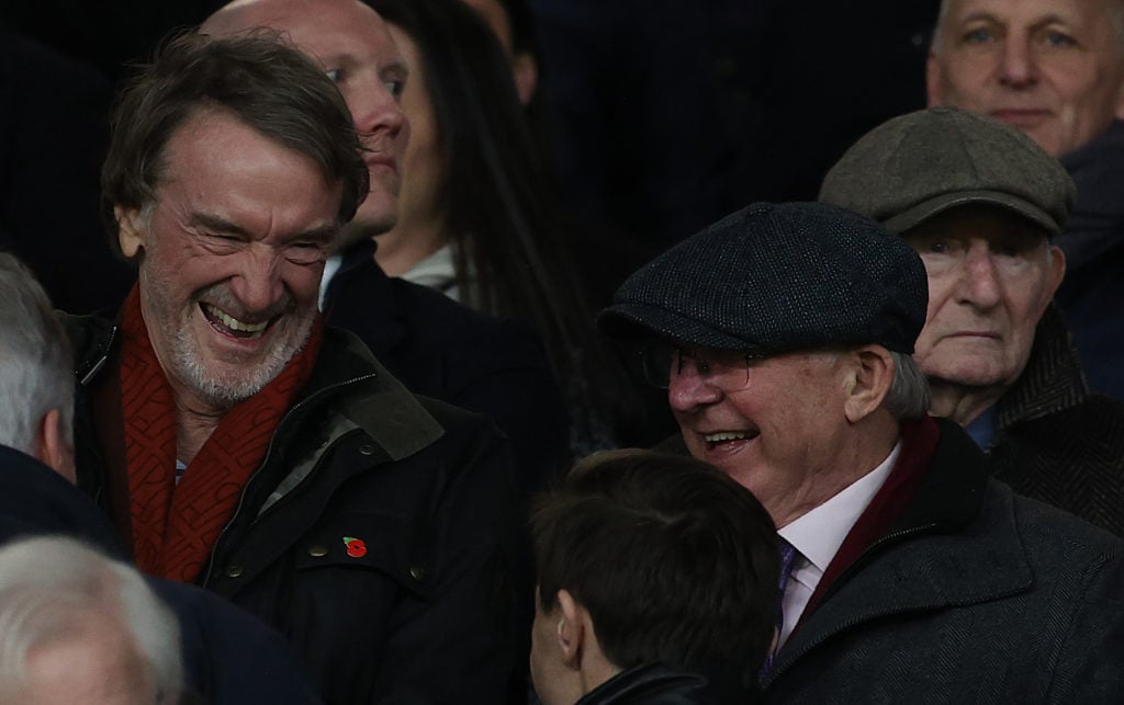 Sir Jim Ratcliffe of INEOS talks to Sir Alex Ferguson in the directors box ahead of the Premier League match between Manchester United and Tottenha...