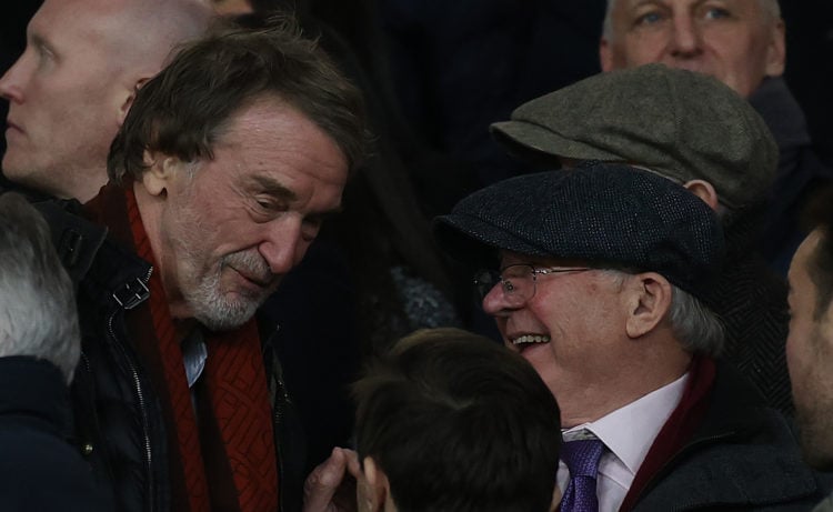 Sir Jim Ratcliffe of INEOS talks to Sir Alex Ferguson in the directors box ahead of the Premier League match between Manchester United and Tottenha...