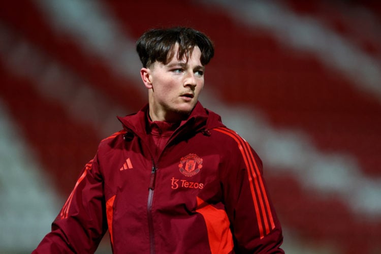 Elyh Harrison of Manchester United warms up ahead of the FA Youth Cup match between Swindon Town and Manchester United at County Ground on January ...