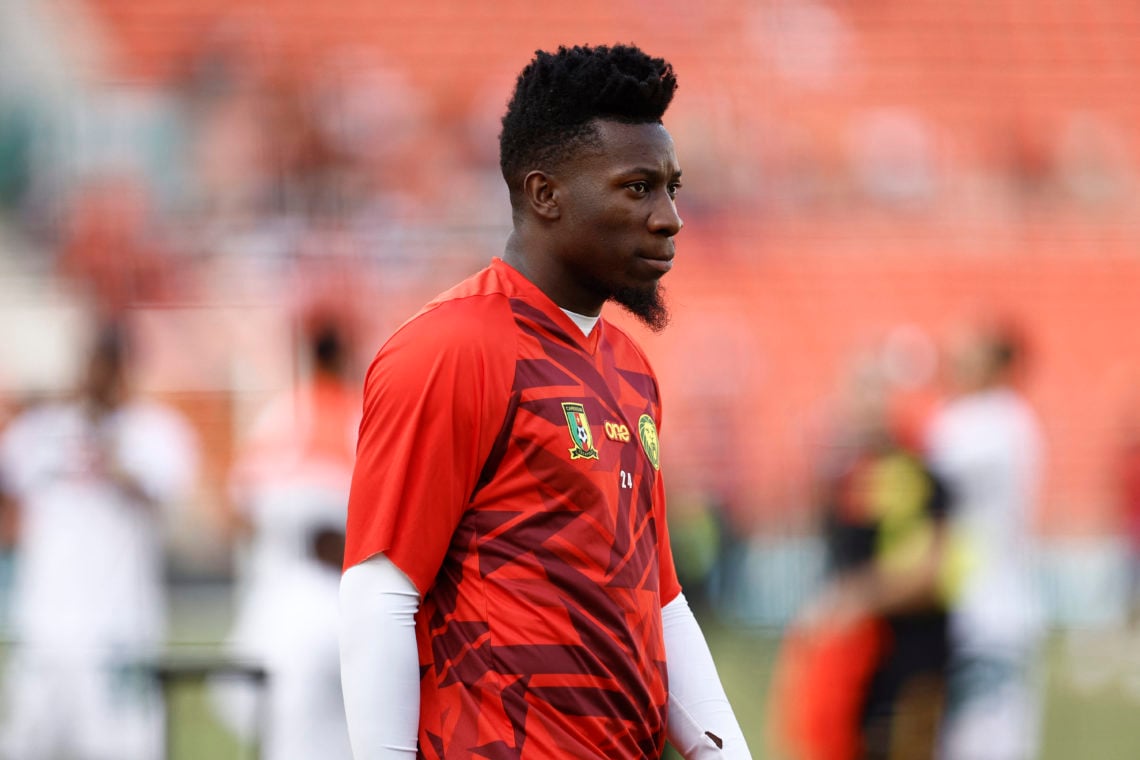 Cameroon's goalkeeper #24 Andre Onana warms up ahead of during the Africa Cup of Nations (CAN) 2024 group C football match between Gambia and Camer...