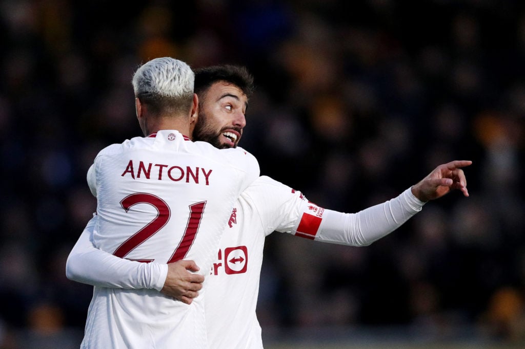 Bruno Fernandes of Manchester United celebrates with Antony of Manchester United after scoring his team's first goal during the Emirates FA Cup Fou...