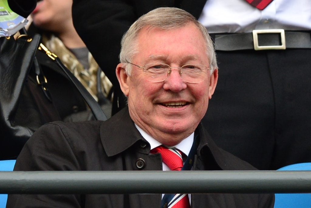 Manchester United's Scottish former manager Alex Ferguson sits in the stands before kick off of the English Premier League football match between M...