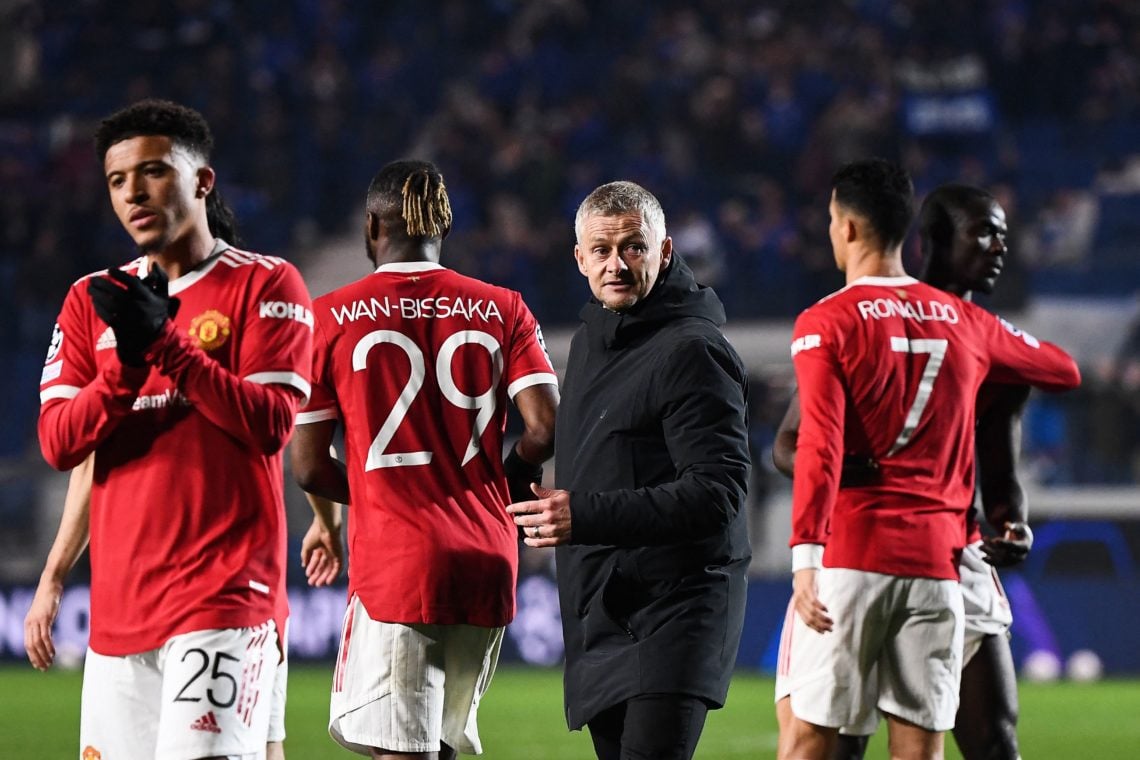 Manchester United's Norway's coach Ole Gunnar Solskjaer (3L) greets his players at the end of the UEFA Champions League group F football match betw...