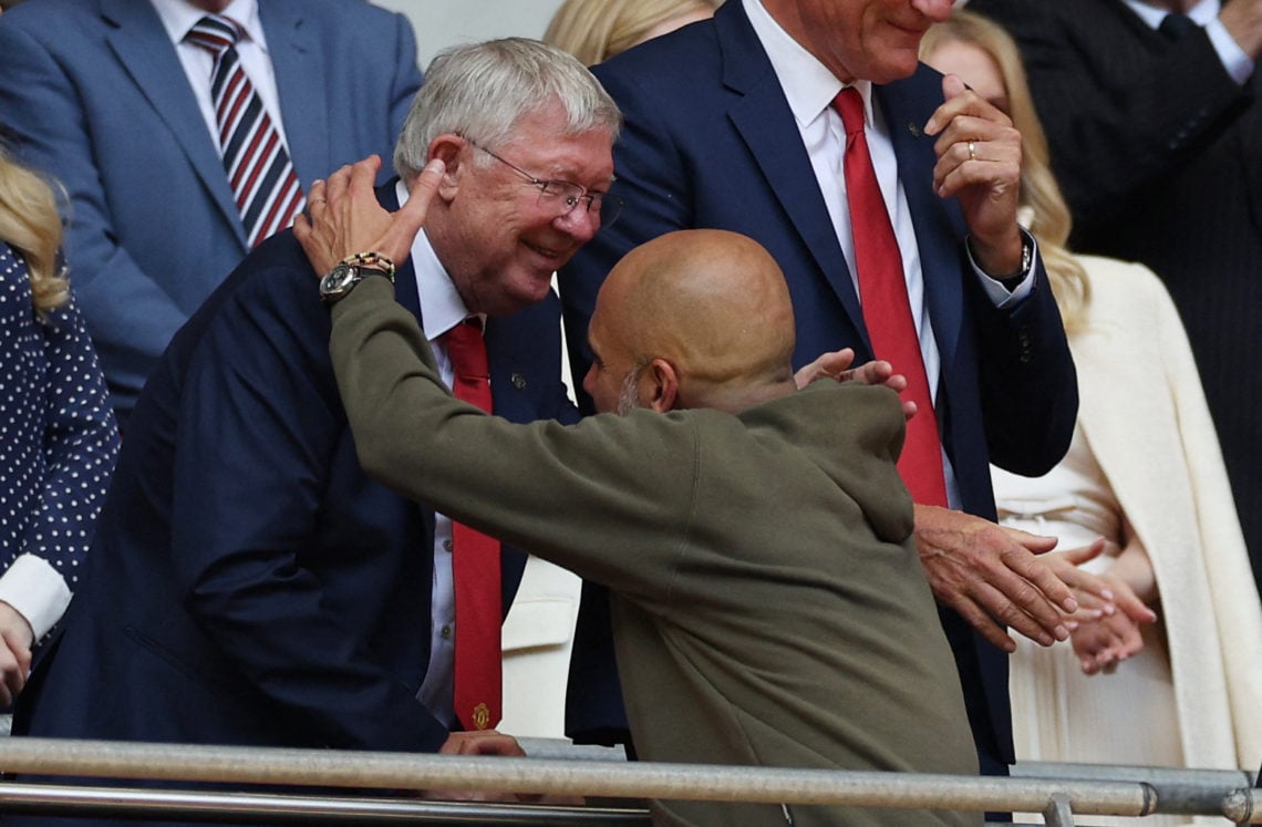 Former Manchester United manager Sir Alex Ferguson (L) shakes hands with Manchester City's Spanish manager Pep Guardiola after the English FA Cup f...