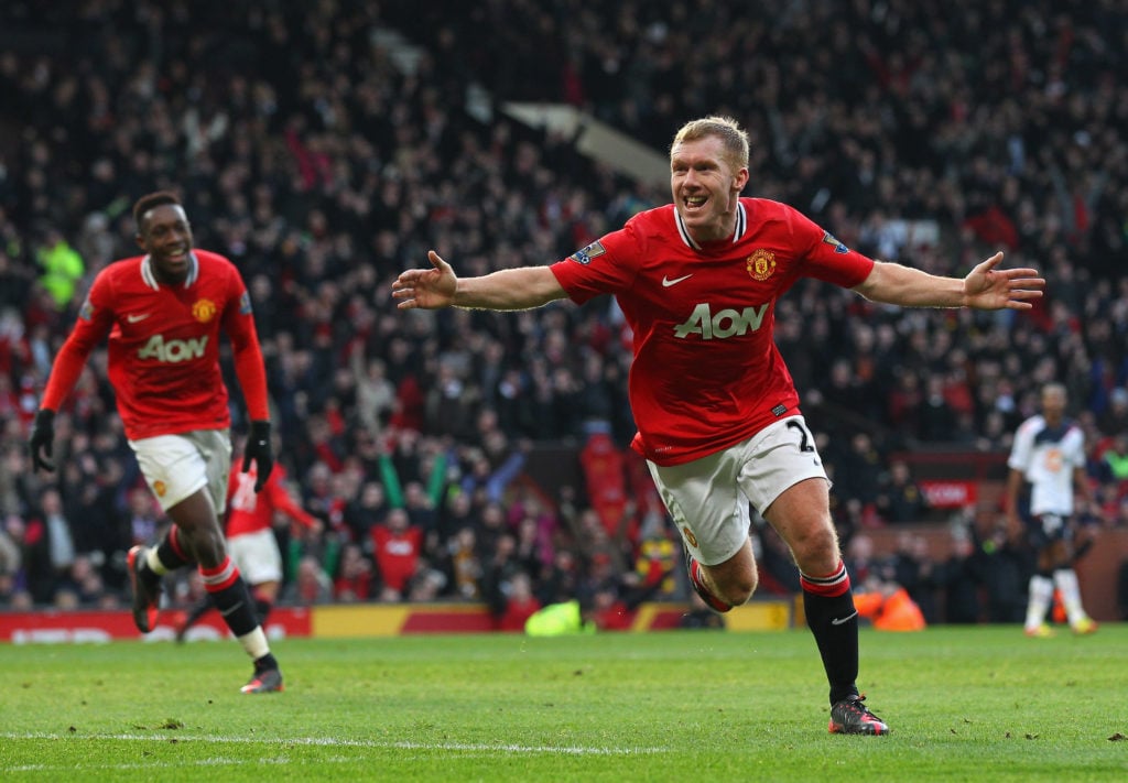 Paul Scholes of Manchester United celebrates after scoring the opening goal during the Barclays Premier League match between Manchester United and ...