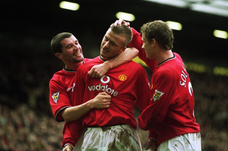 2 Feb 2002:  Manchester United David Beckham (centre) celebrates his goal with team-mates Roy Keane (left) and Ole Gunnar Solskjaer (right) during ...