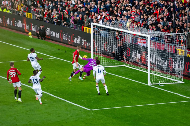 Rasmus Hojlund of Manchester United in action with Thomas Kaminski of Luton Town during the Premier League match between Manchester United and Luto...