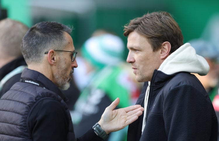 (LR) Director license Thomas Eichin of Bayer 04 Leverkusen and director license Clemens Fritz of SV Werder Bremen look on ahead of the Bundesliga m...