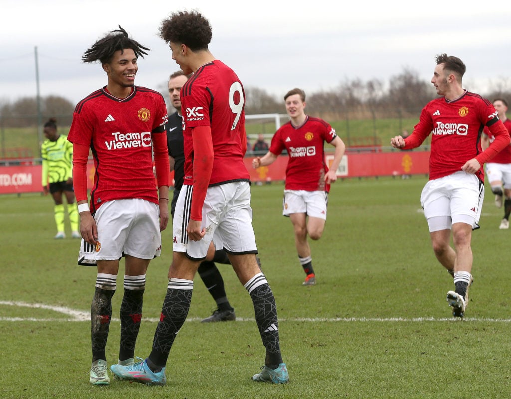 Ethan Williams of Manchester United U18s celebrates scoring their third goal during the U18 Premier League match between Manchester United U18s and...