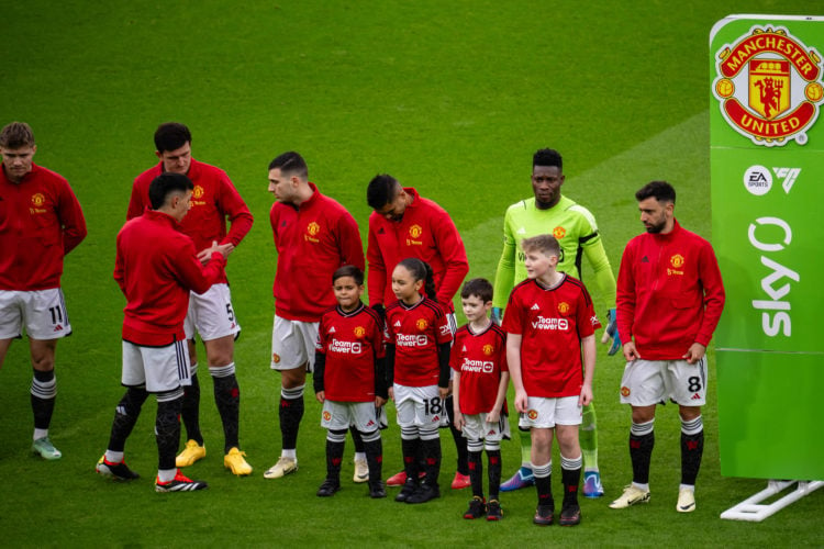 Bruno Fernandes, Andre Onana, Casemiro, Diogo Dalot, Harry Maguire, Lisandro Martinez and Rasmus Hojlund of Manchester United line up ahead of the ...