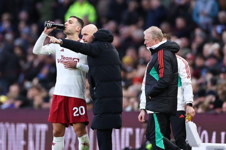 Erik ten Hag the head coach / manager of Manchester United instructs Diogo Dalot of Manchester United during the Premier League match between Aston...